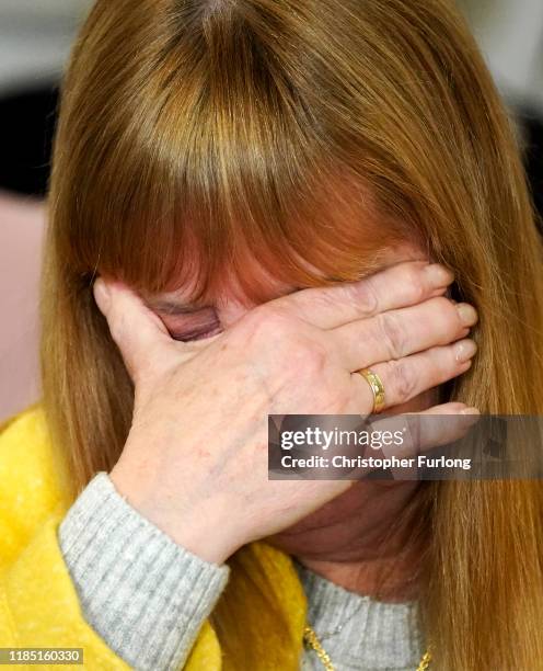 Margaret Aspinall, whose 18-year-old son James was killed in the disaster, becomes emotional during a press conference at the Cunard Building after...