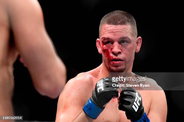 Nate Diaz of the United States fights against Jorge Masvidal of the United States in the Welterweight "BMF" championship bout during UFC 244 at...