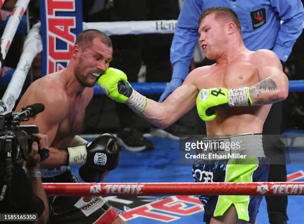 Canelo Alvarez hits Sergey Kovalev in the 10th round of their WBO light heavyweight title fight at MGM Grand Garden Arena on November 2, 2019 in Las...