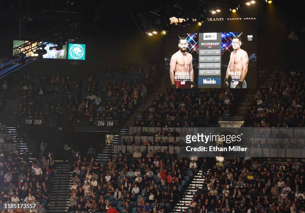 The UFC 244 welterweight bout between Jorge Masvidal and Nate Diaz from Madison Square Garden in New York City is shown on screens at MGM Grand...