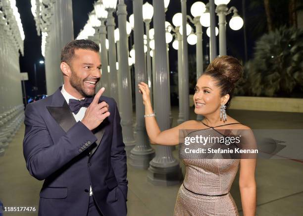 Ricky Martin and Salma Hayek Pinault, both wearing Gucci, attend the 2019 LACMA Art + Film Gala Presented By Gucci at LACMA on November 02, 2019 in...
