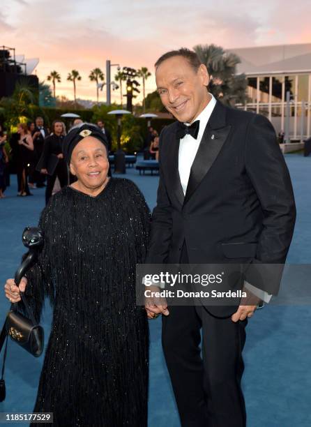 Betye Saar, wearing Gucci, and Neil Lane attend the 2019 LACMA Art + Film Gala Presented By Gucci at LACMA on November 02, 2019 in Los Angeles,...