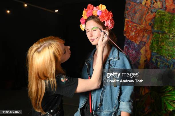 Artist Alexa Meade paints during PATRÓN Tequila’s Día de Muertos Celebration at City Libre on November 02, 2019 in Los Angeles, California.