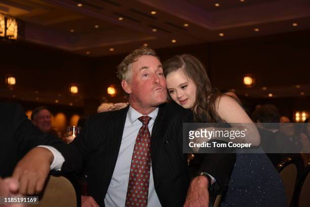 John C. McGinley gets hug from Megan Bomgaars at the Global Down Syndrome Foundation's Be Beautiful Be Yourself Fashion Show at Sheraton Denver...