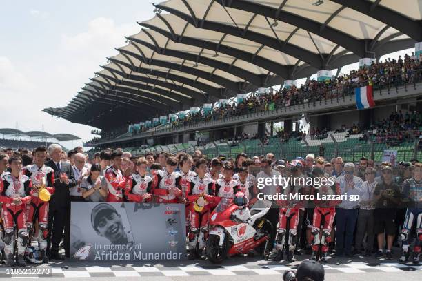 The MotoGP family remember the young rider Afridza Munandar of Indonesia with a minute of silence on track during the MotoGP of Malaysia - Race at...