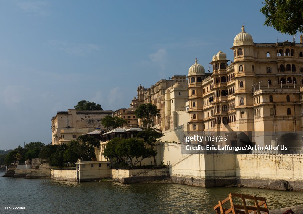 The city palace alongside lake Pichola, Rajasthan, Udaipur, India...
