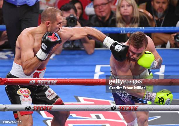 Sergey Kovalev hits Canelo Alvarez with a left in the second round of their WBO light heavyweight title fight at MGM Grand Garden Arena on November...