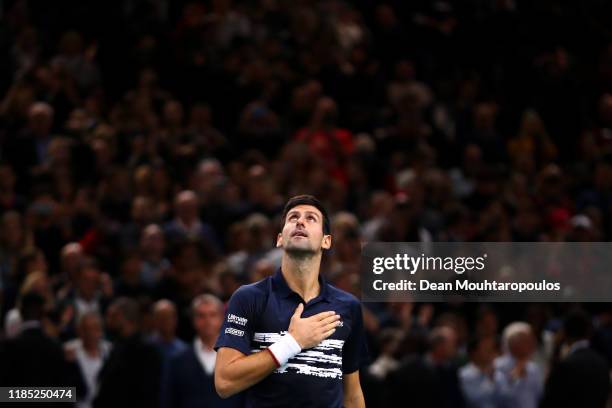 Novak Djokovic of Serbia celebrates victory in the Men's Singles Final match against Denis Shapovalov of Canada on day 7 of the Rolex Paris Masters,...