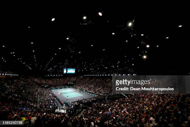 General view of the stadium as Novak Djokovic of Serbia returns a backhand in his Men's Singles Final match against Denis Shapovalov of Canada on day...