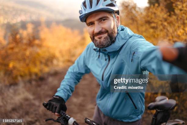 selfie - cycling helmet stock pictures, royalty-free photos & images