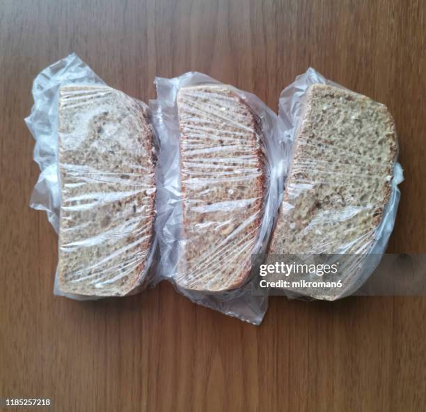 sandwich food packaging clear plastic bag - plastic bread bags stock pictures, royalty-free photos & images