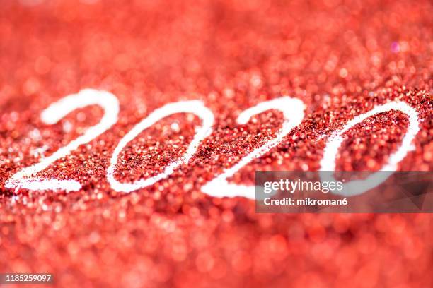2020 happy new year background red glitter - 2020 vision stock pictures, royalty-free photos & images
