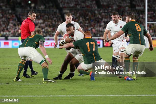 Billy Vunipola of England is tackled by Steven Kitshoff of South Africa during the Rugby World Cup 2019 Final between England and South Africa at...