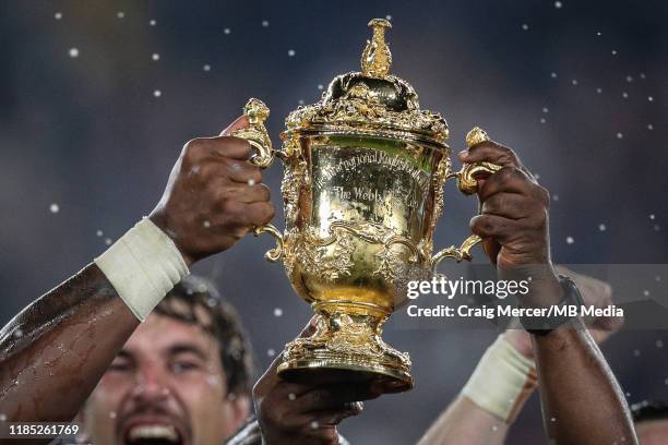 South Africa players lift the Webb Ellis Cup after their side win the Rugby World Cup 2019 Final between England and South Africa at International...