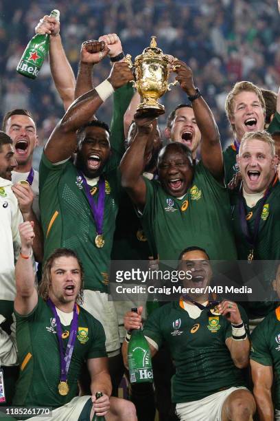 Cyril Ramaphosa, President of South Africa lifts the Webb Ellis Cup with Siya Kolisi after their side win the Rugby World Cup 2019 Final between...
