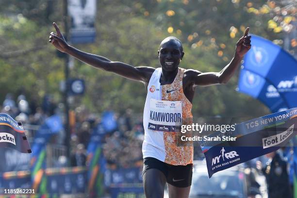 Geoffrey Kamworor of Kenya reacts after crossing the finish line to win the Men's Division of the 2019 TCS New York City Marathon on November 03,...