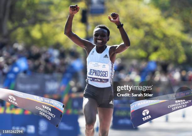 Joyciline Jepkosgei of Kenya reacts as she crosses the finish line to win the Women's Division of the 2019 TCS New York City Marathon on November 03,...