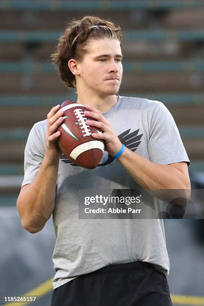 Justin Herbert of the Oregon Ducks warms up prior to taking on the Washington State Cougars during their game at Autzen Stadium on October 26, 2019...