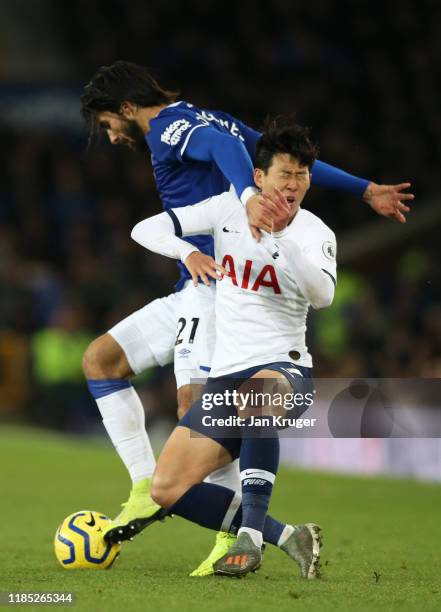 Andre Gomes of Everton looks to break past Son Heung-Min of Tottenham Hotspur during the Premier League match between Everton FC and Tottenham...