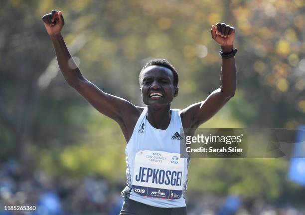 Joyciline Jepkosgei of Kenya reacts as she crosses the finish line to win the Women's Division of the 2019 TCS New York City Marathon on November 03,...