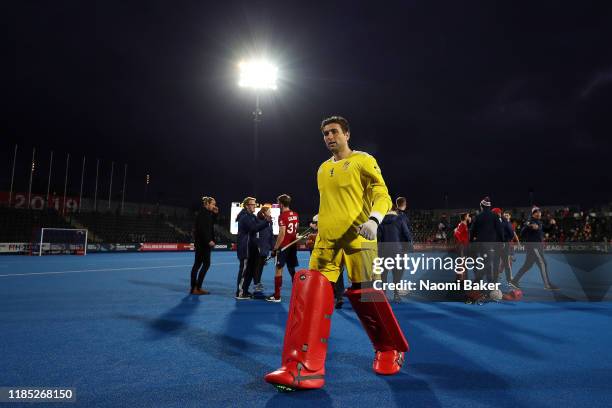 George Pinner of Great Britain walks off the field after his teams victory in the Olympic Qualifier match between Great Britain and Malaysia at Lee...
