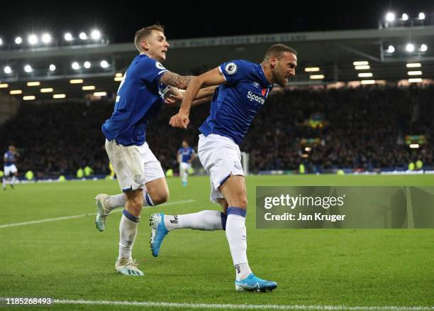 Cenk Tosun of Everton celebrates after scoring his sides first goal during the Premier League match between Everton FC and Tottenham Hotspur at...