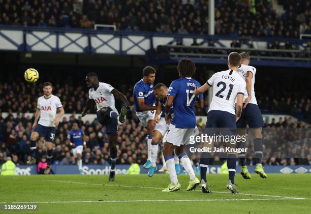 Cenk Tosun of Everton scores his sides first goal during the Premier League match between Everton FC and Tottenham Hotspur at Goodison Park on...