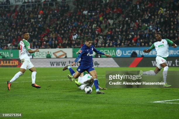 Amine Harit of Schalke scores the 3rd team goal during the Bundesliga match between FC Augsburg and FC Schalke 04 at WWK-Arena on November 03, 2019...