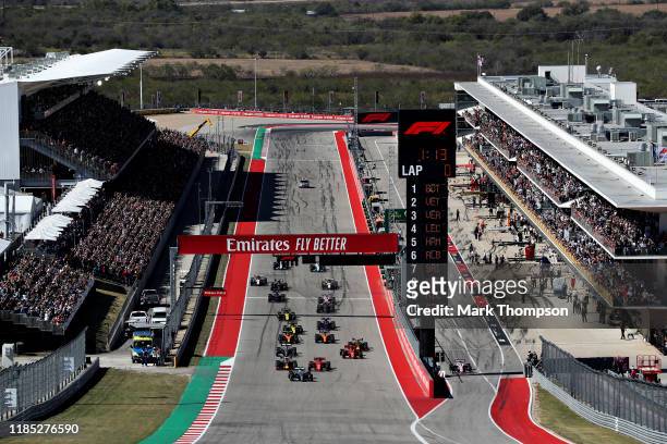 Valtteri Bottas driving the Mercedes AMG Petronas F1 Team Mercedes W10 leads the field into turn one at the start during the F1 Grand Prix of USA at...