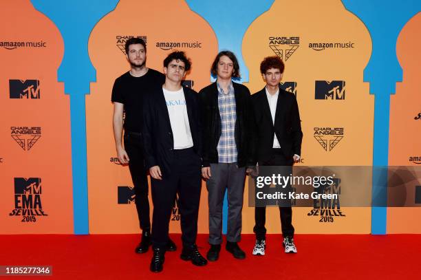 Ross MacDonald, Matthew Healy, George Daniel and Adam Hann of the " The 1975" attend the MTV EMAs 2019 at FIBES Conference and Exhibition Centre on...