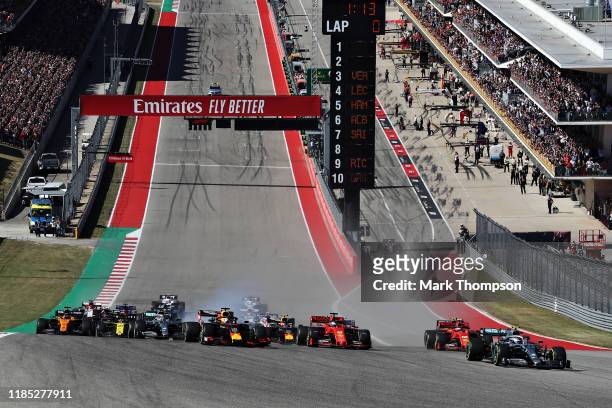 Valtteri Bottas driving the Mercedes AMG Petronas F1 Team Mercedes W10 leads Max Verstappen of the Netherlands driving the Aston Martin Red Bull...