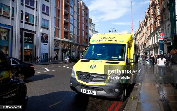 london ambulance - veicolo terrestre stock pictures, royalty-free photos & images