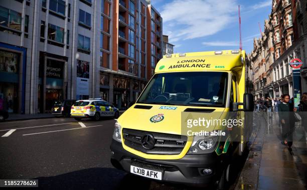 london ambulance - veicolo terrestre stock pictures, royalty-free photos & images