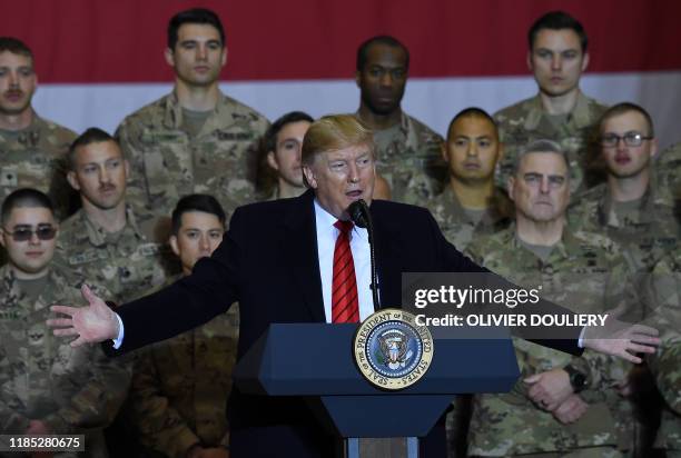 President Donald Trump speaks to the troops during a surprise Thanksgiving day visit at Bagram Air Field, on November 28, 2019 in Afghanistan.