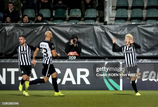 Partizan's Japanese forward Takuma Asano celebrates after scoring a goal during the UEFA Europa League Group L football match between AZ Alkmaar and...
