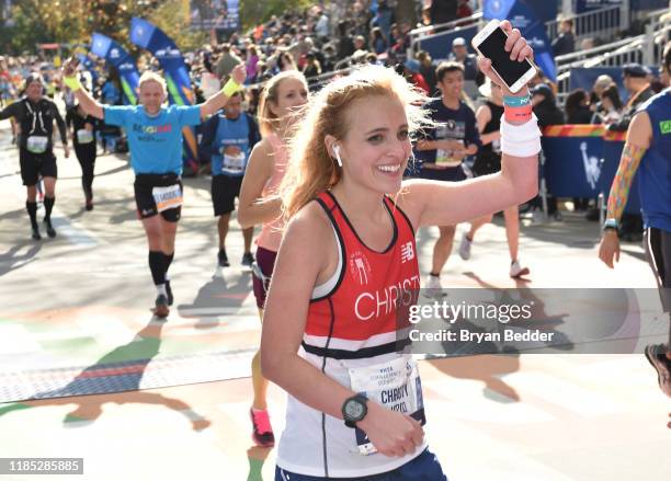 Christy Altomare crosses the finish line at the 2019 TCS New York City Marathon on November 03, 2019 in New York City.