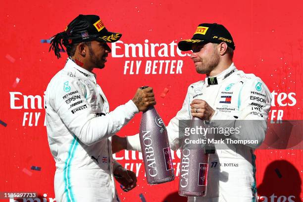 Formula One World Drivers Champion Lewis Hamilton of Great Britain and Mercedes GP and race winner Valtteri Bottas of Finland and Mercedes GP...