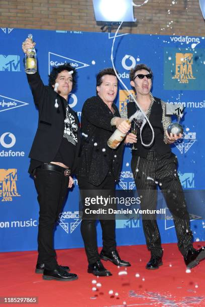 Billie Joe Armstrong, Tre Cool and Mike Dirnt of Green Day in the winners room during the MTV EMAs 2019 at FIBES Conference and Exhibition Centre on...