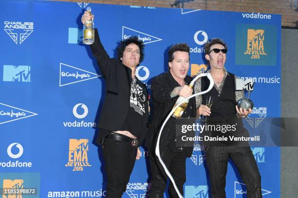 Billie Joe Armstrong, Tre Cool and Mike Dirnt of Green Day in the winners room during the MTV EMAs 2019 at FIBES Conference and Exhibition Centre on...