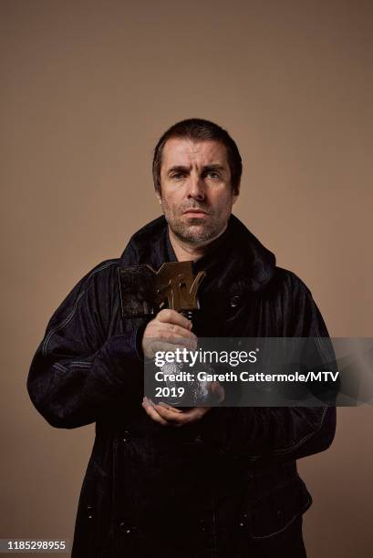 Liam Gallagher poses with the Rock Icon Award at the MTV EMAs 2019 studio at FIBES Conference and Exhibition Centre on November 03, 2019 in Seville,...