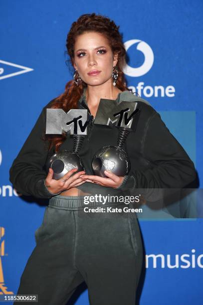 Halsey poses with the Best Pop and Best Look awards in the winners room during the MTV EMAs 2019 at FIBES Conference and Exhibition Centre on...