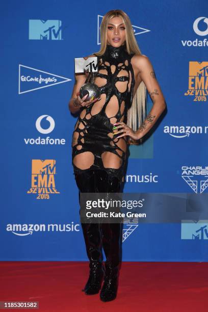 Pabllo Vittar poses with the Best Brazilian Music Award in the winners room during the MTV EMAs 2019 at FIBES Conference and Exhibition Centre on...