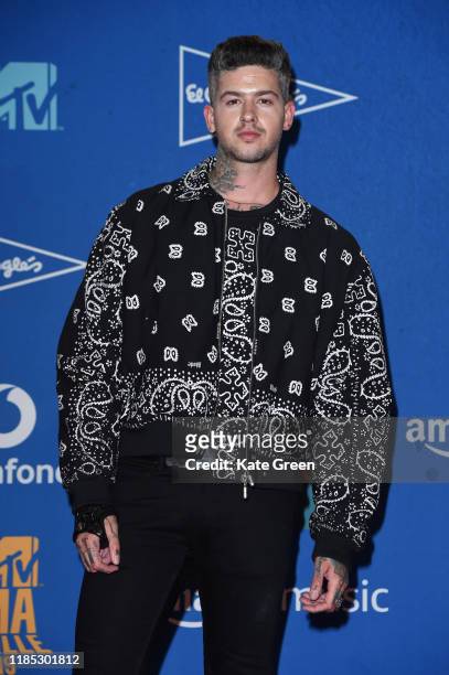 Travis Mills poses in the winners room during the MTV EMAs 2019 at FIBES Conference and Exhibition Centre on November 03, 2019 in Seville, Spain.