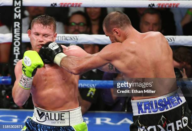 Sergey Kovalev hits Canelo Alvarez in the ninth round of their WBO light heavyweight title fight at MGM Grand Garden Arena on November 2, 2019 in Las...
