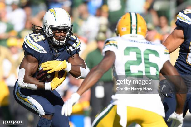 Melvin Gordon of the Los Angeles Chargers carries the ball during the first half against the Green Bay Packers at Dignity Health Sports Park on...