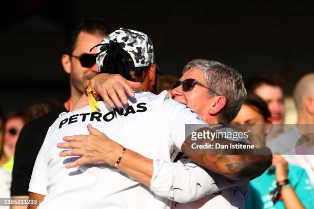 Formula One World Drivers Champion Lewis Hamilton of Great Britain and Mercedes GP celebrates with his mother Carmen Larbalestier after the F1 Grand...