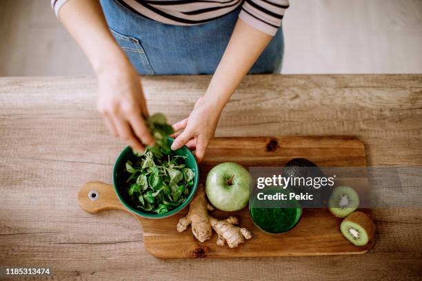 i can't go a day without my green juice - raw food diet stock pictures, royalty-free photos & images