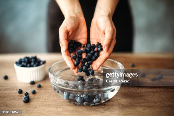 rich in antioxidants and so tasty - blueberries in bowl stock pictures, royalty-free photos & images