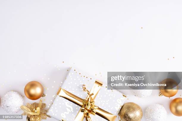 celebration and holiday composition. christmas, birthday, wedding or anniversary gift on white background with star glitter frame. trendy concept for postcard or invitation - december birthday stock pictures, royalty-free photos & images