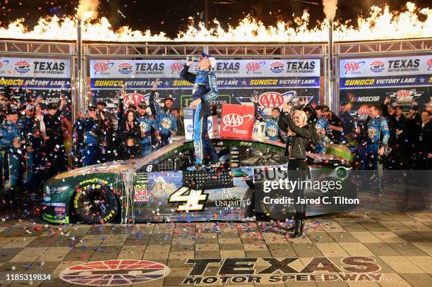 Kevin Harvick, driver of the Busch Beer/Ducks Unlimited Ford, celebrates in Victory Lane after winning the Monster Energy NASCAR Cup Series AAA Texas...